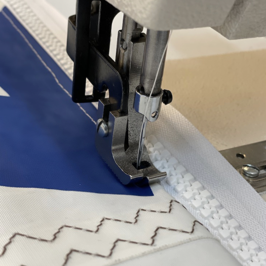 stitching on recycled sailcloth bag